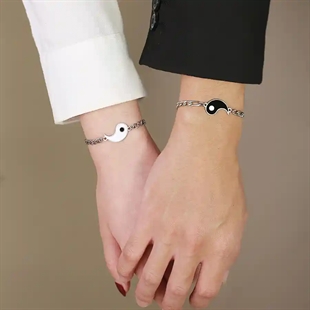 Yin and Yang pararmbånd i rustfri stål.